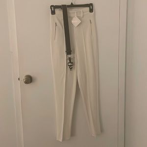 Cream colored tapered pant with belt Never worn.